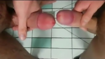 Two Men Jerk And Grind Their Cocks In A Public Toilet And Cum On Each Other