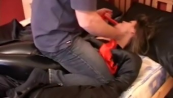 Astounding Teen With A Fetish And A Nice Ass In A Leather Attire Getting Tied Up On A Bed