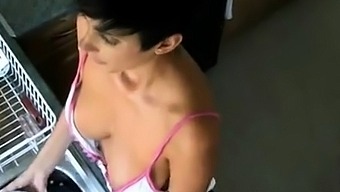 Downblouse Of Kim Doing The Dishes