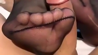 Intense Footjob Action With A Young Asian Teen Wearing Black Stockings